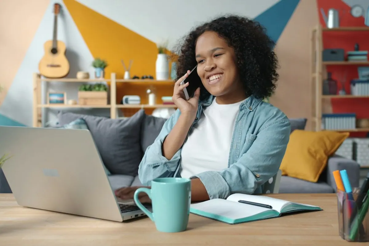 Patient talking with her care team by phone and video from a comfortable home setting
