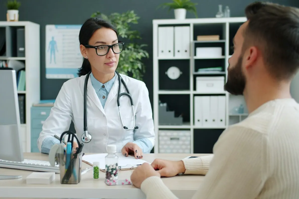 Physician speaking with a patient about a personalized methamphetamine addiction treatment plan