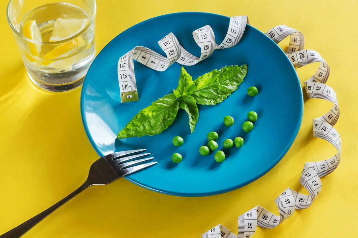 Healthy plate with a measuring tape — a medical weight management plan